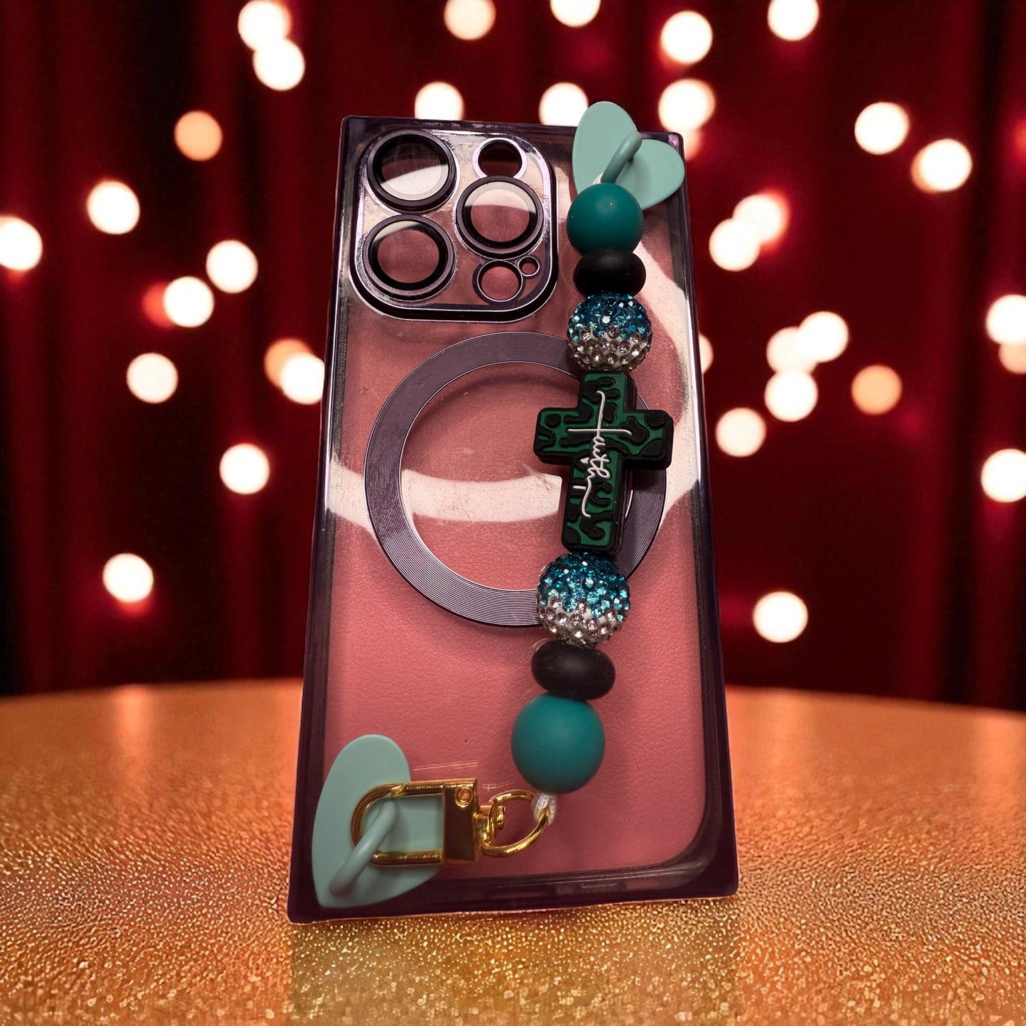Phone charm chains with adhesive backing