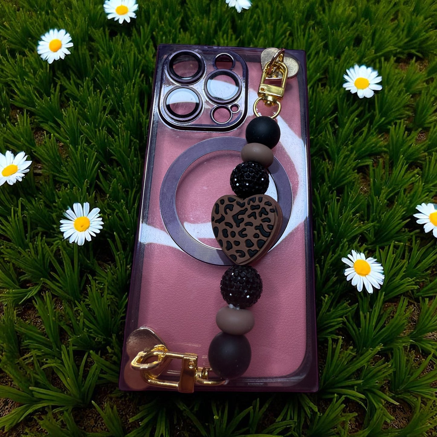 Phone charm chains with adhesive backing