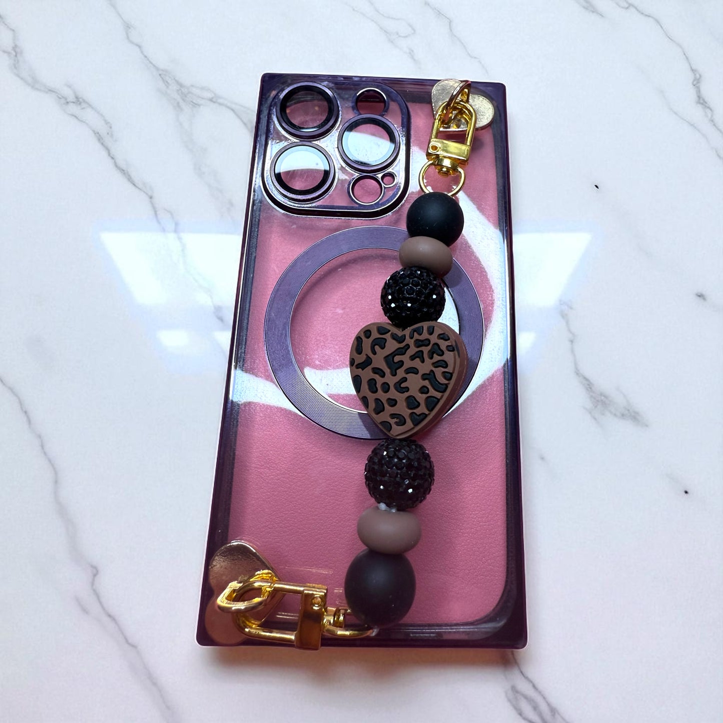 Phone charm chains with adhesive backing