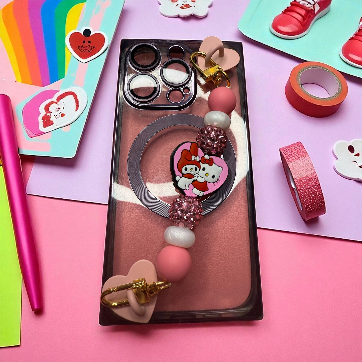 Phone charm chains with adhesive backing