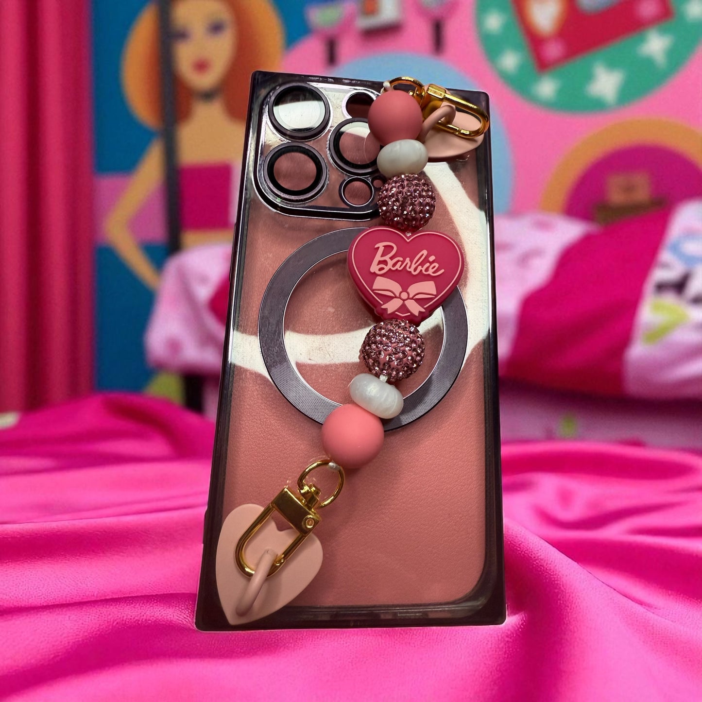 Phone charm chains with adhesive backing