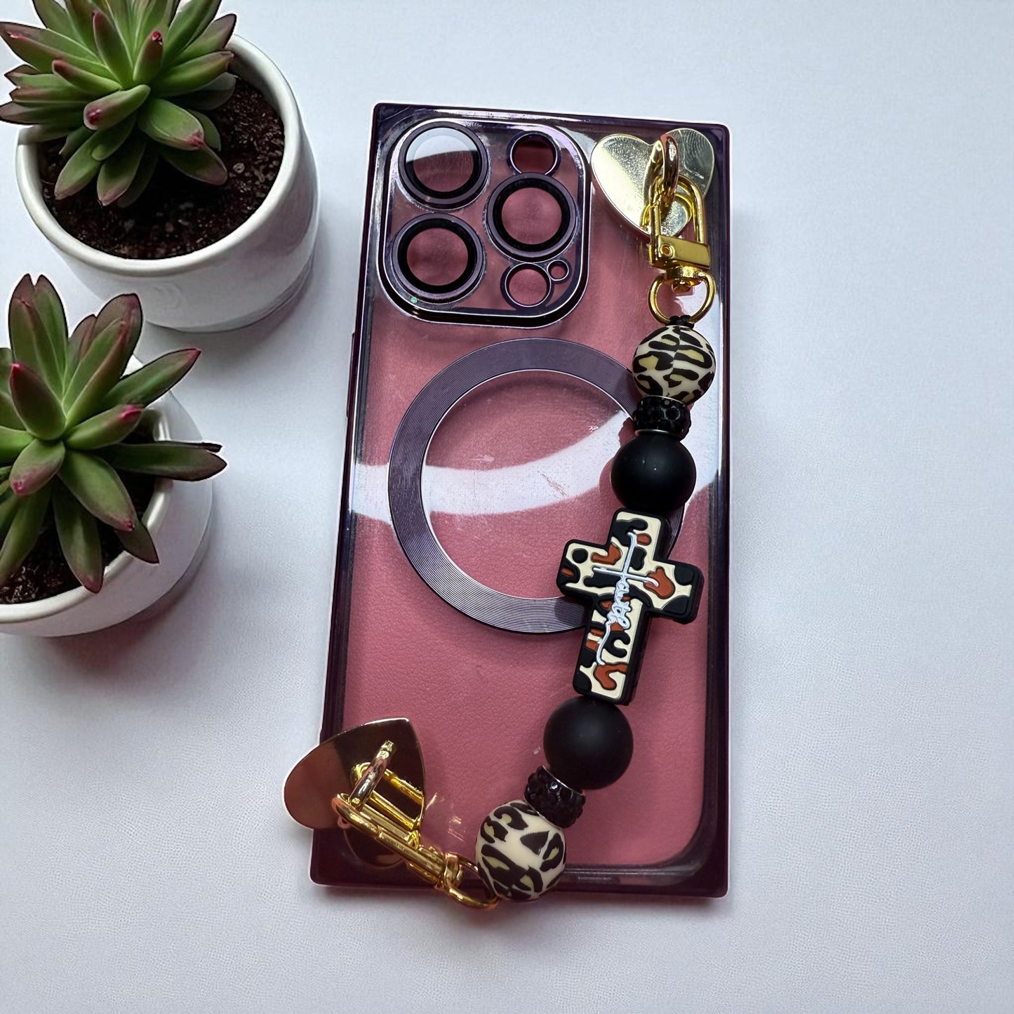 Phone charm chains with adhesive backing