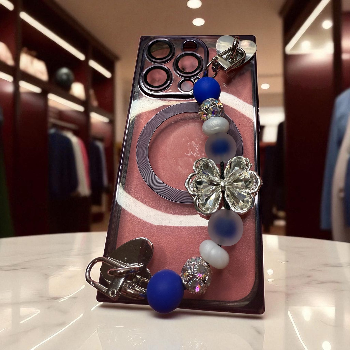 Phone charm chains with adhesive backing